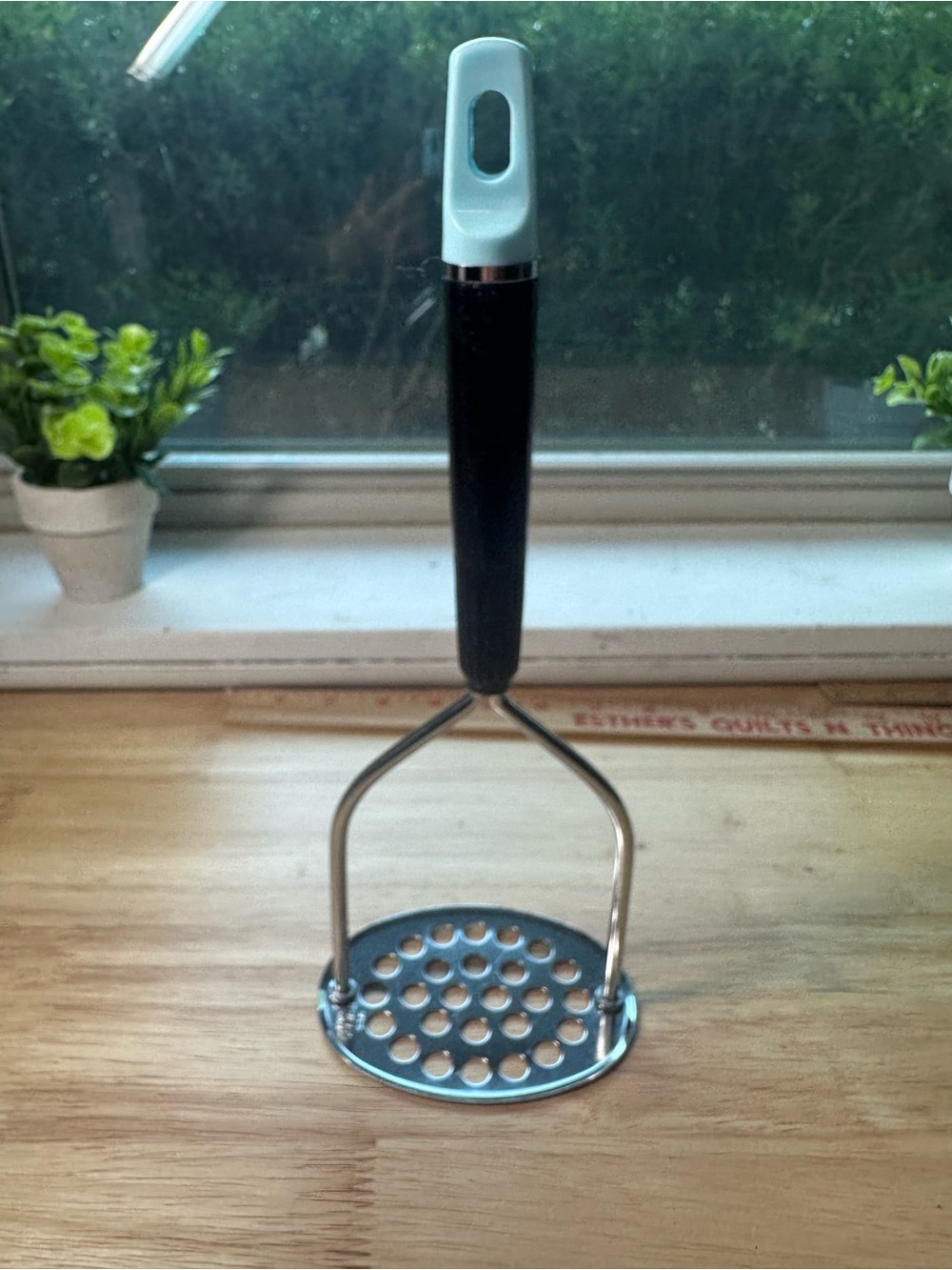 Vintage top drawer Black and Light Blue Stainless Potato Masher